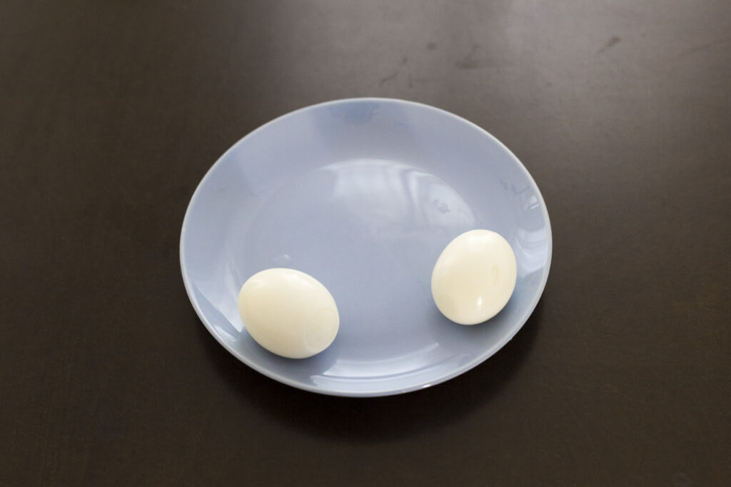 Two Eggs on Plate - ברגר יוסי