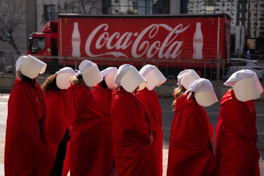 Protesters supporting women's rights dressed as characters from The Handmaid's Tale TV series - בלילטי עודד